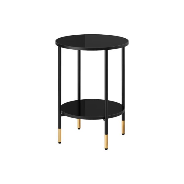 Black round side table with golden feet